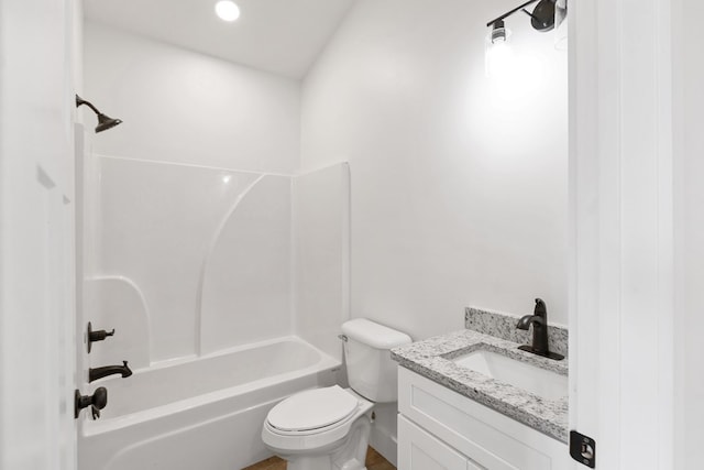 full bath with toilet, shower / bathtub combination, and vanity