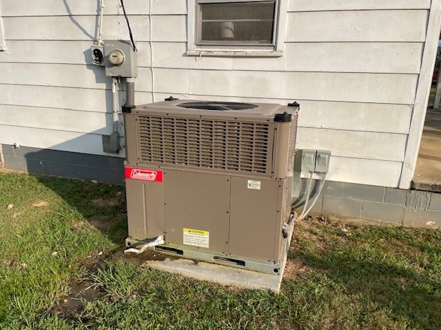 exterior details with electric meter and central air condition unit