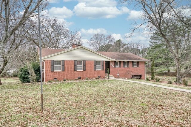 ranch-style house featuring brick siding, driveway, crawl space, a front lawn, and a chimney