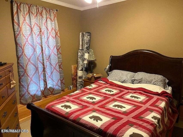 bedroom featuring crown molding