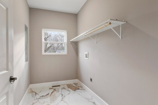 clothes washing area with laundry area, washer hookup, visible vents, baseboards, and marble finish floor