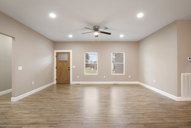 interior space featuring recessed lighting, visible vents, ceiling fan, and wood finished floors