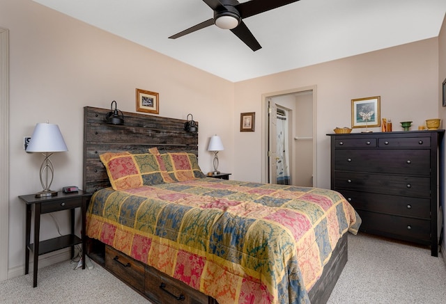 bedroom with light carpet, ceiling fan, and baseboards