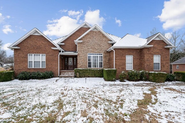 view of front of home with brick siding