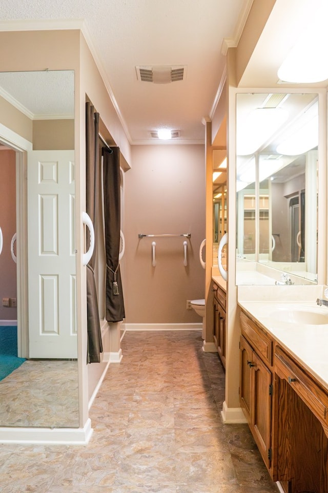 full bathroom featuring vanity, visible vents, and crown molding