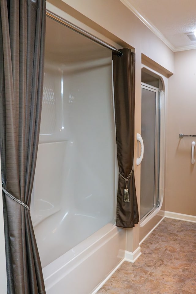 full bathroom with baseboards, crown molding, and a shower with shower curtain