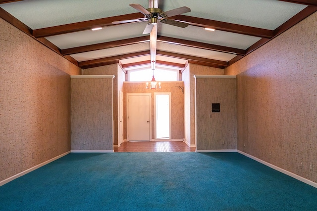 entryway with carpet, lofted ceiling with beams, and wallpapered walls