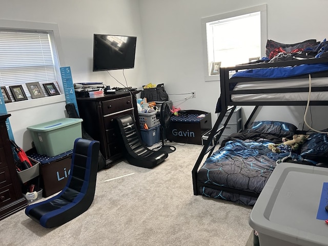 bedroom with light carpet