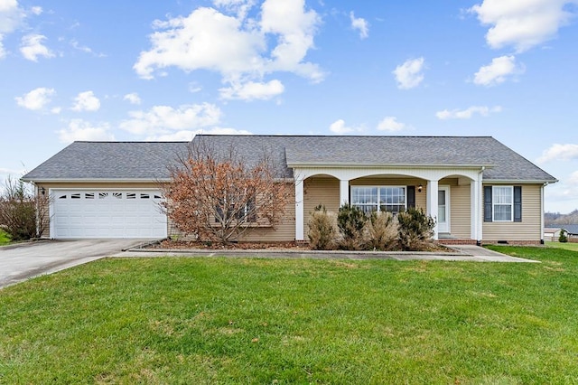 ranch-style home with driveway, crawl space, an attached garage, and a front yard