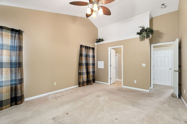 unfurnished room featuring light carpet, high vaulted ceiling, a ceiling fan, and baseboards