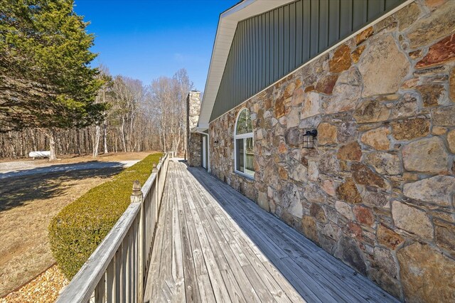 view of property exterior with stone siding