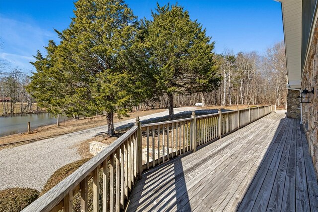 deck featuring a water view