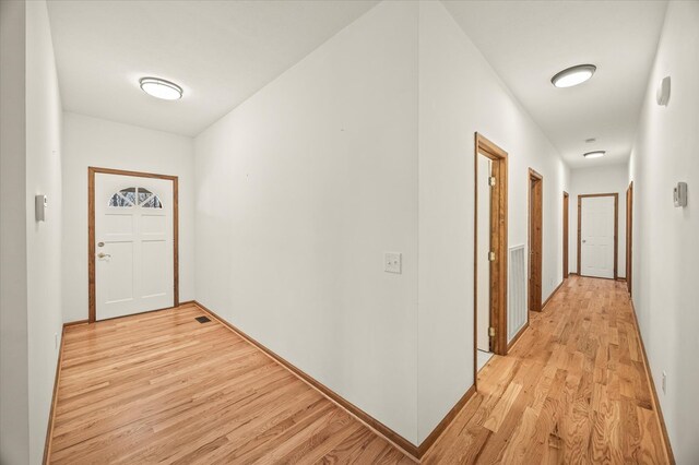 hall featuring light wood-type flooring