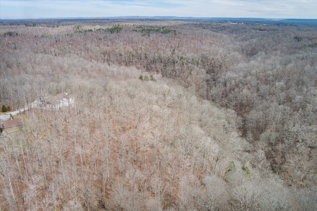 aerial view featuring a view of trees