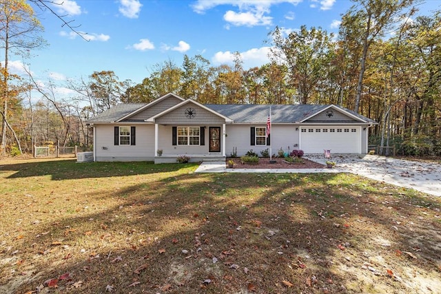 ranch-style house featuring a garage, concrete driveway, a front lawn, and fence