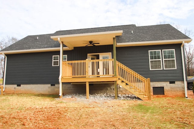 rear view of property with a ceiling fan, roof with shingles, stairway, crawl space, and a wooden deck