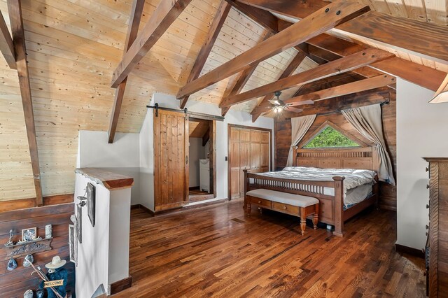 bedroom featuring dark wood-style floors, wooden ceiling, lofted ceiling with beams, and a barn door