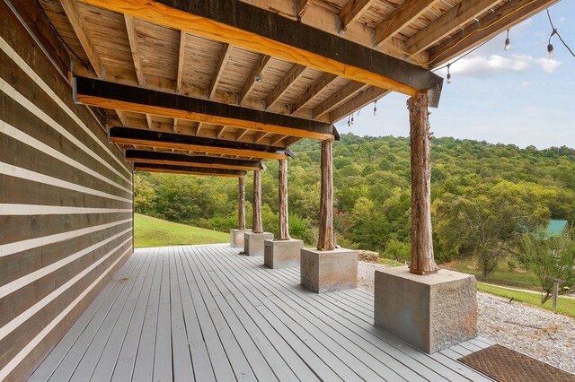 deck featuring a forest view