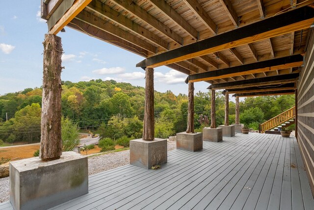 wooden terrace featuring stairway