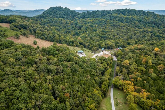 aerial view featuring a view of trees