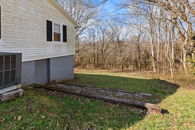 view of yard featuring central AC unit