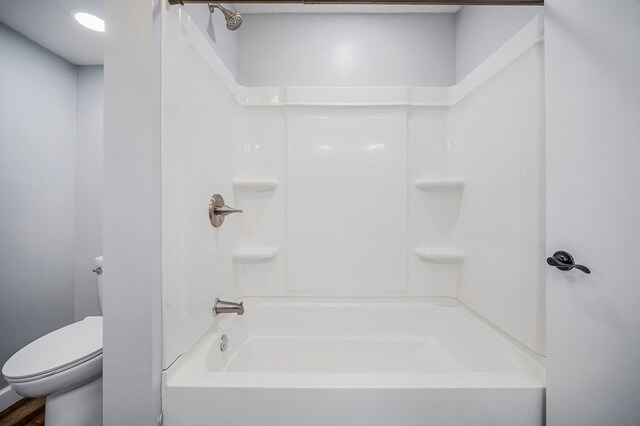 full bathroom with shower / washtub combination and toilet