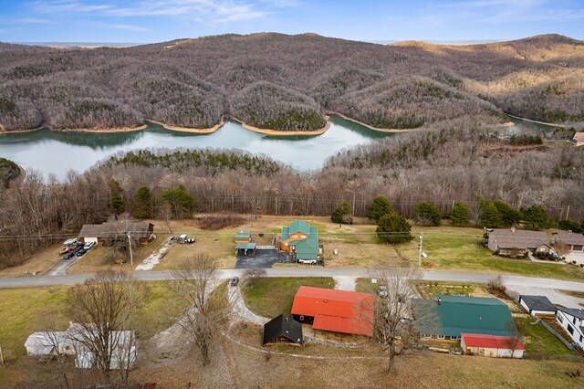 aerial view featuring a water and mountain view