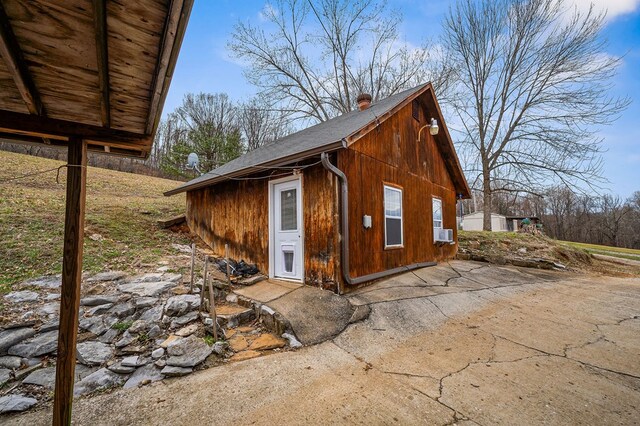 view of home's exterior featuring cooling unit