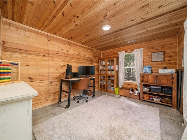 office space with wooden ceiling and wooden walls