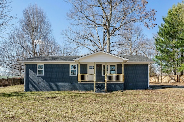 view of front of home featuring fence, covered porch, a front lawn, crawl space, and brick siding