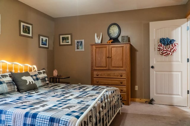 bedroom with light carpet