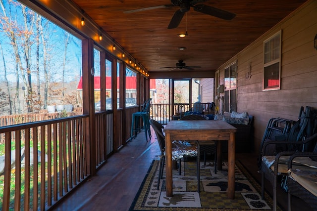 sunroom with wood ceiling