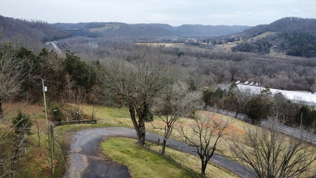 mountain view featuring a rural view