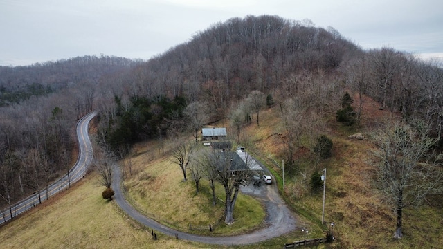 aerial view featuring a view of trees