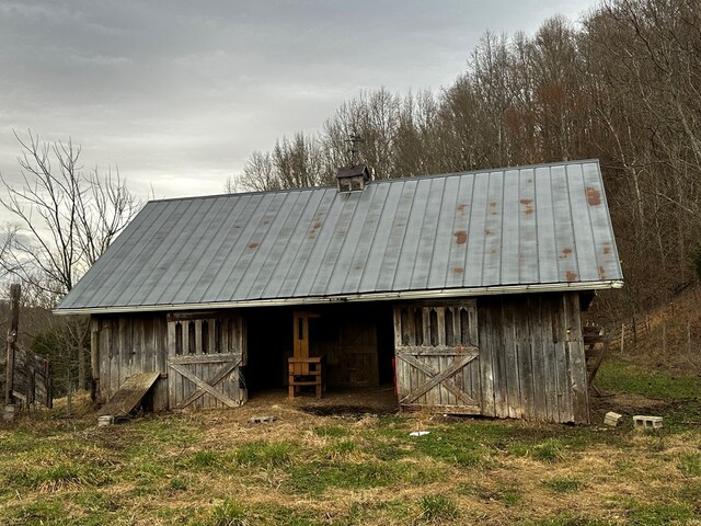 exterior space featuring an outdoor structure