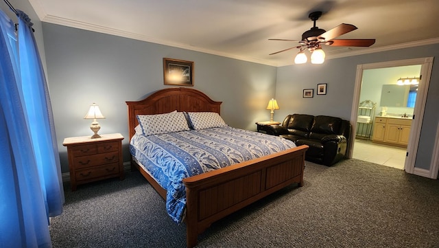 carpeted bedroom featuring a ceiling fan, ornamental molding, and connected bathroom