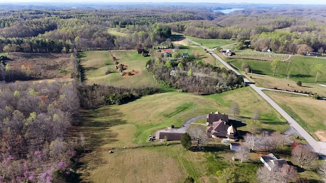 aerial view featuring a rural view and a forest view