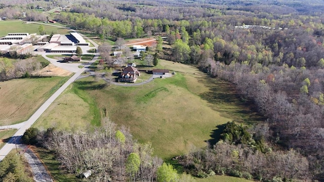 drone / aerial view with a rural view and a view of trees