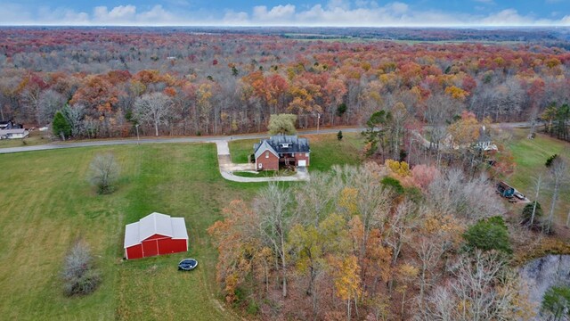 aerial view with a wooded view