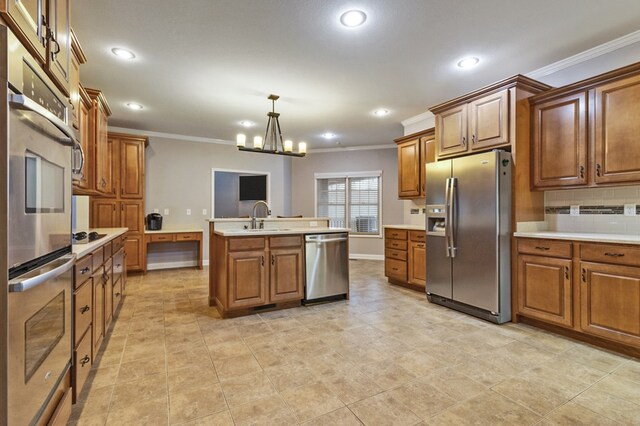 kitchen with stainless steel appliances, brown cabinets, and a sink