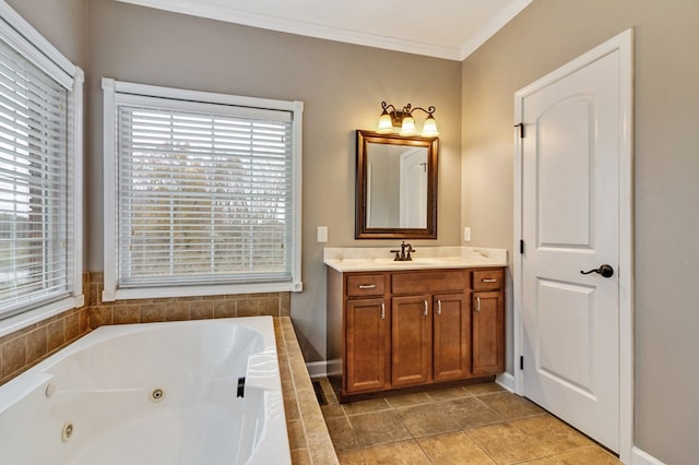 full bath featuring crown molding, plenty of natural light, vanity, and a tub with jets