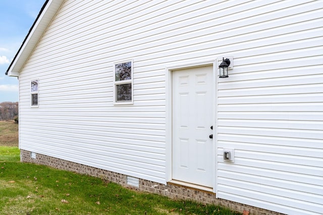 doorway to property featuring crawl space