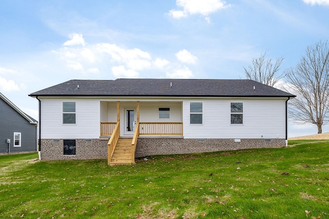 back of house featuring crawl space, covered porch, a lawn, and stairway