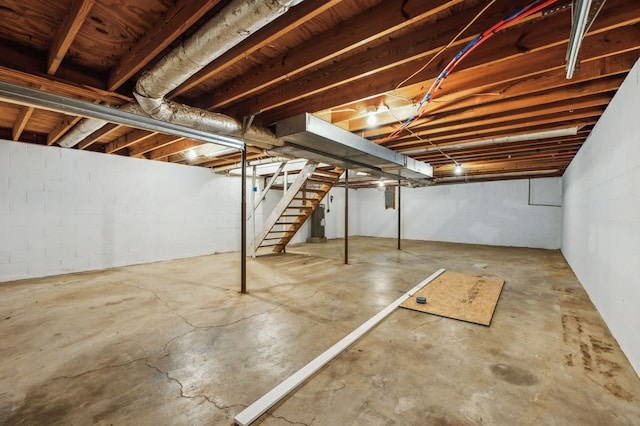 unfinished basement with stairs