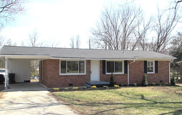 ranch-style home featuring crawl space, a carport, concrete driveway, and brick siding