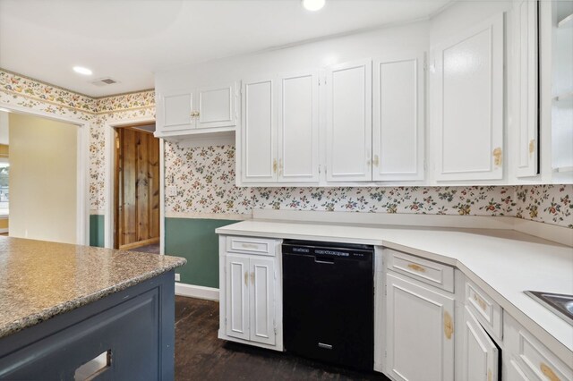 kitchen featuring visible vents, white cabinets, light countertops, dishwasher, and wallpapered walls