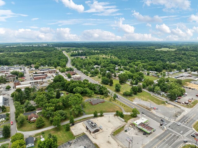 aerial view with a wooded view