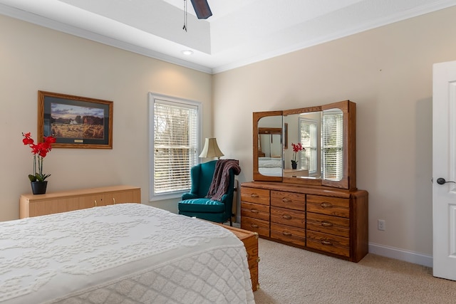 bedroom with baseboards, multiple windows, light carpet, and ornamental molding