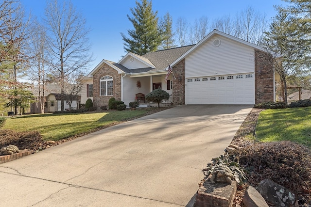 ranch-style house featuring brick siding, concrete driveway, and a front yard