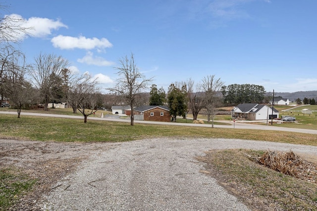 view of road with a residential view